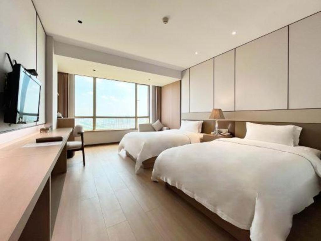 Howard Johnson By Wyndham Sunshine Plaza Нинбо Экстерьер фото